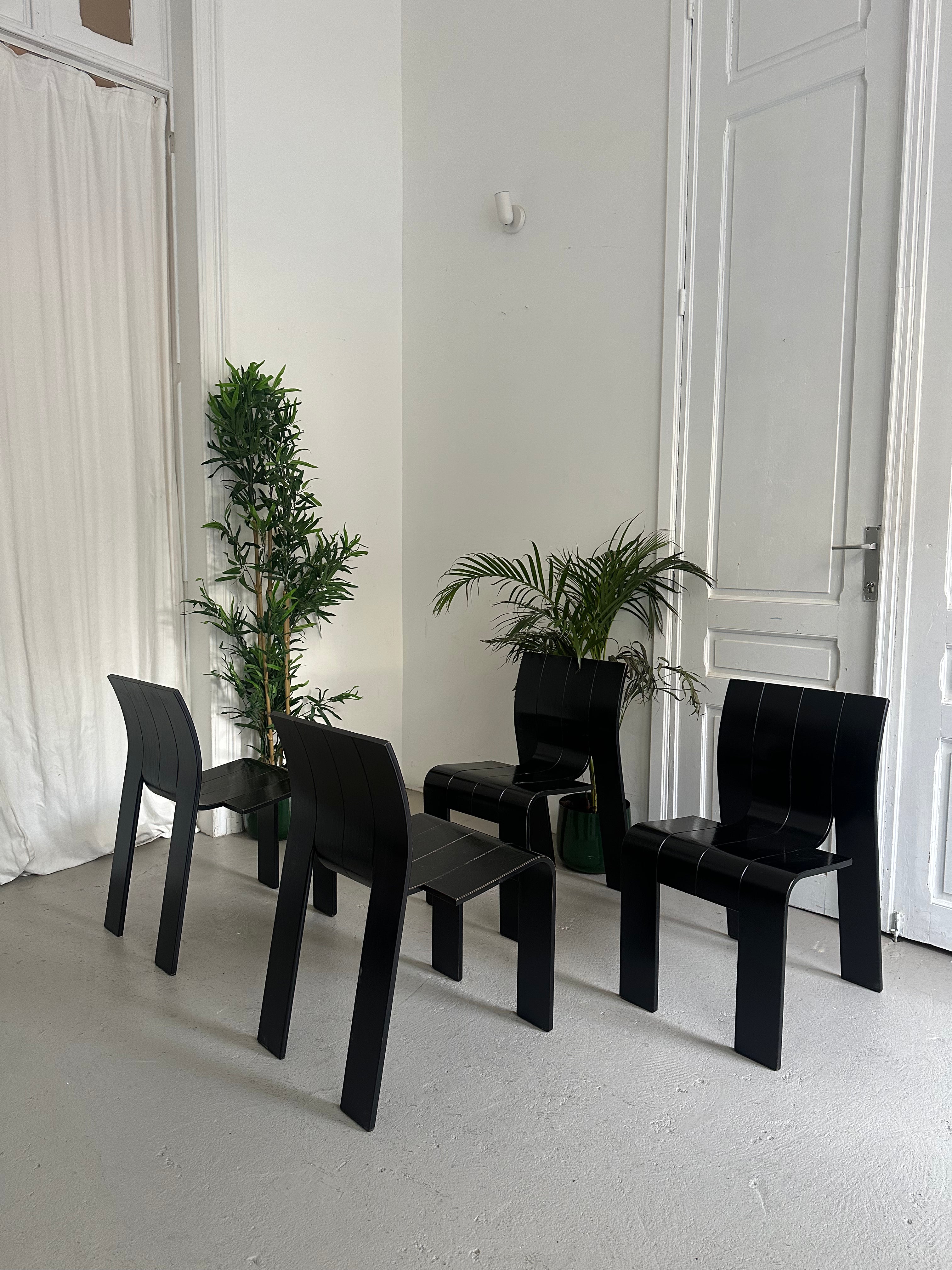 4 chaises noires Gijs Bakker