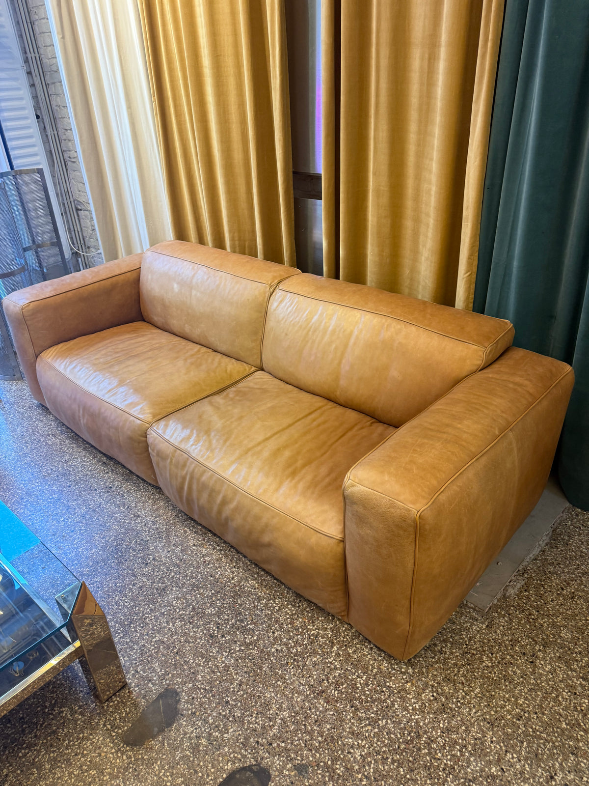 Fauteuil en cuir cognac de la marque Flamant