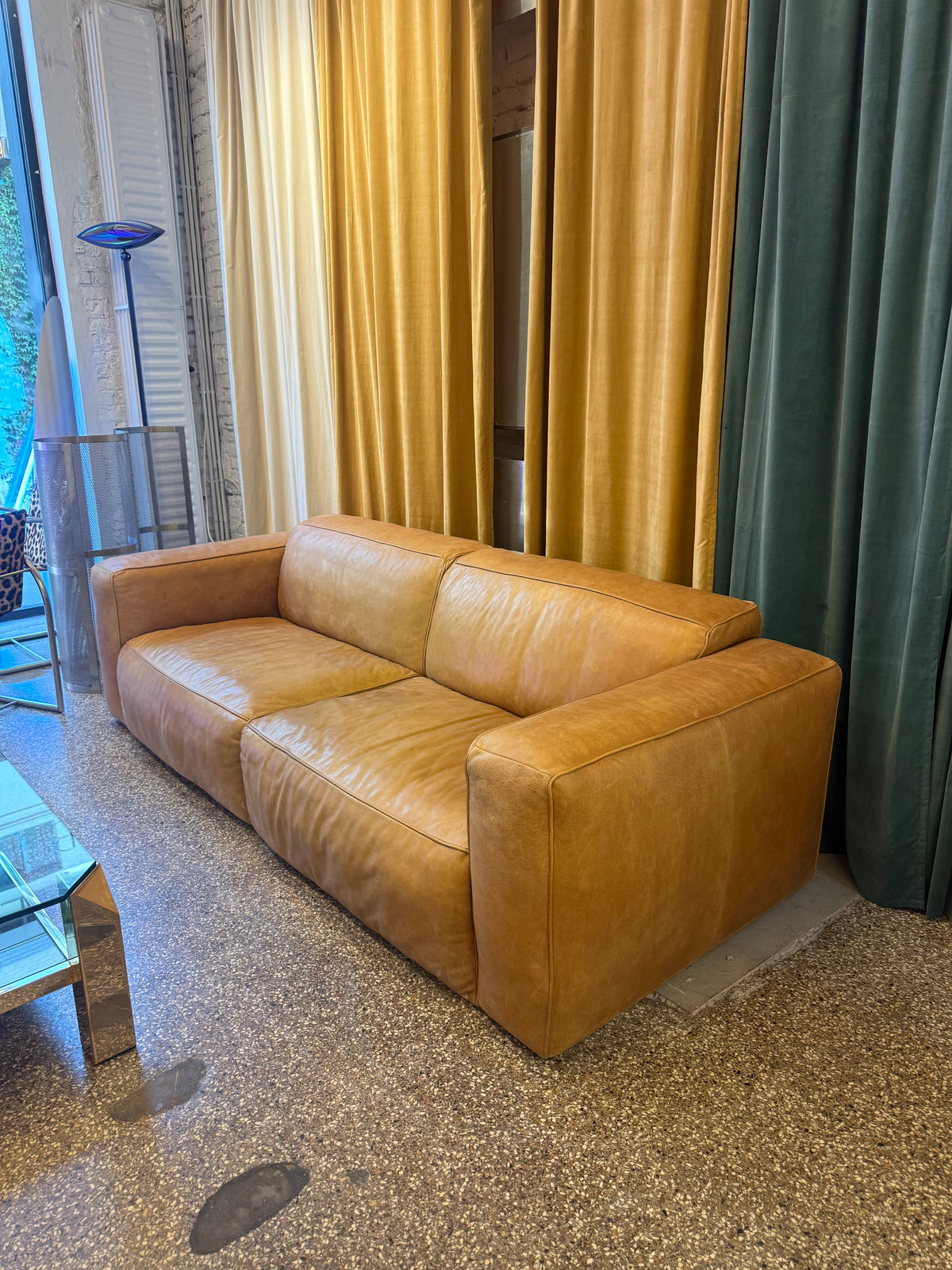 Fauteuil en cuir cognac de la marque Flamant