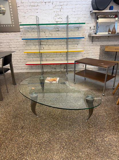 Table basse unique en inox et verre