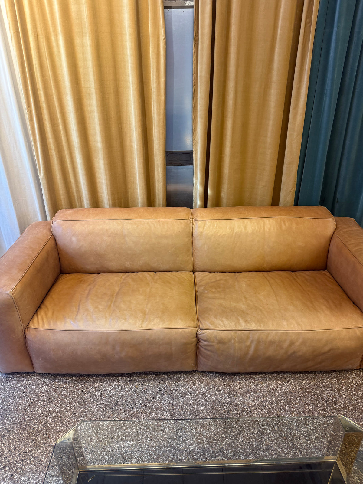 Fauteuil en cuir cognac de la marque Flamant